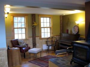 The cosy back parlor area looks out over the back yard.