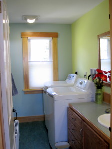 Our house has a full laundry with washer and dryer. Detergent provided!  The laundry room also has a half bath with new toilet and new sink.  The small window looks out onto the back yard.  There's also a small box with a few simple first-aid things, and a few spare toothbrushes, if you forgot one.